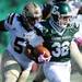 Eastern Michigan sophomore Javonti Greene runs the ball during the second half against Western Michigan at Rynearson Stadium on Saturday afternoon. Melanie Maxwell I AnnArbor.com